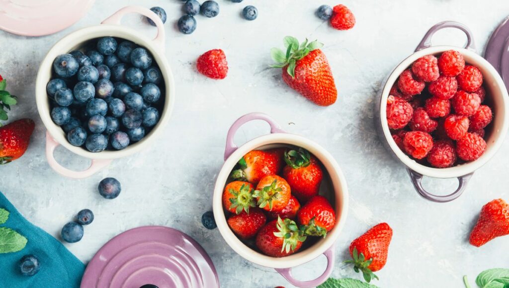 selection of berries in bowls 